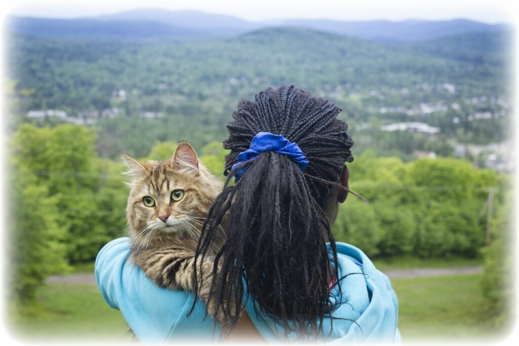 LADY HOLDING CAT